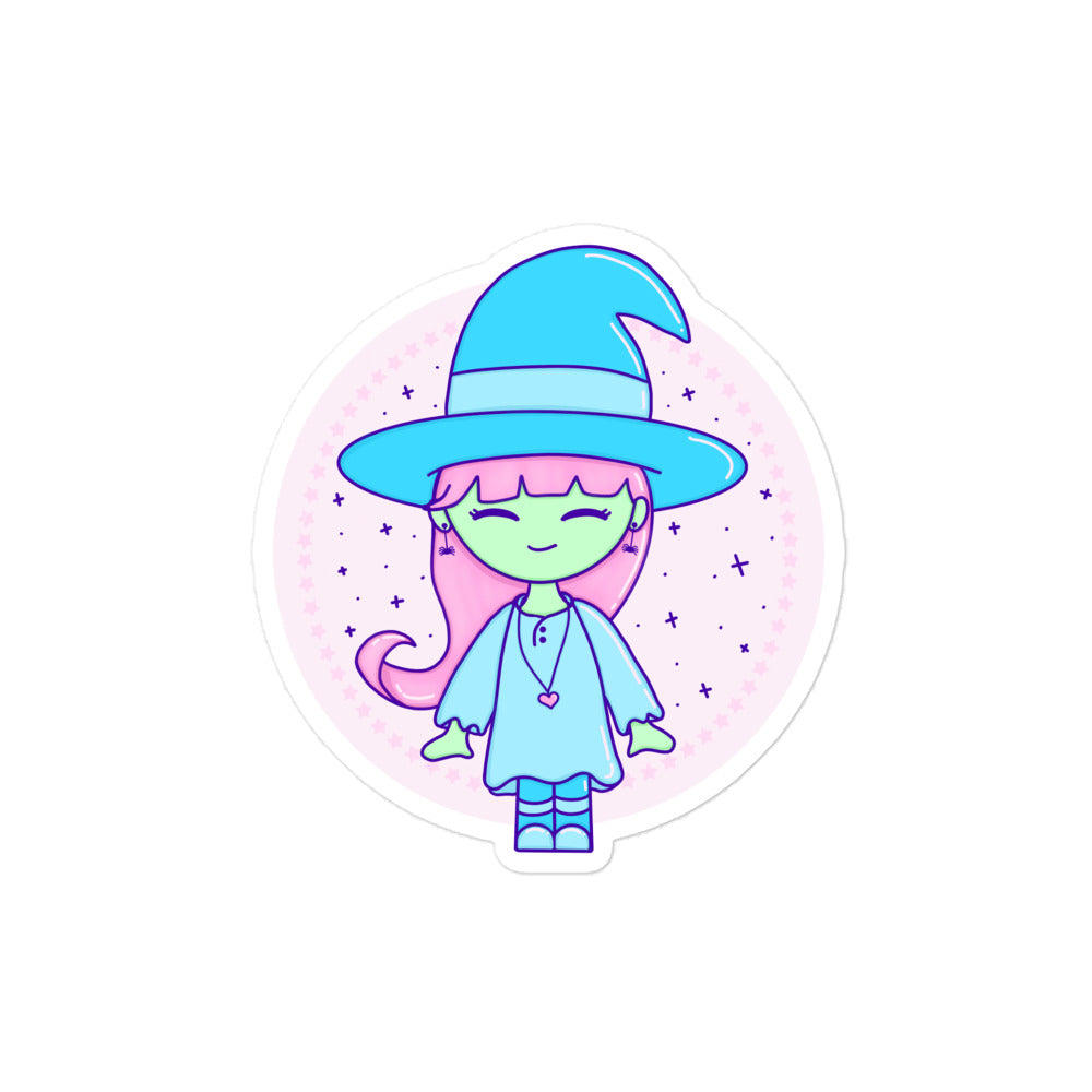 vinyl sticker of an illustrated kawaii witch with pink hair and wearing blue with green skin