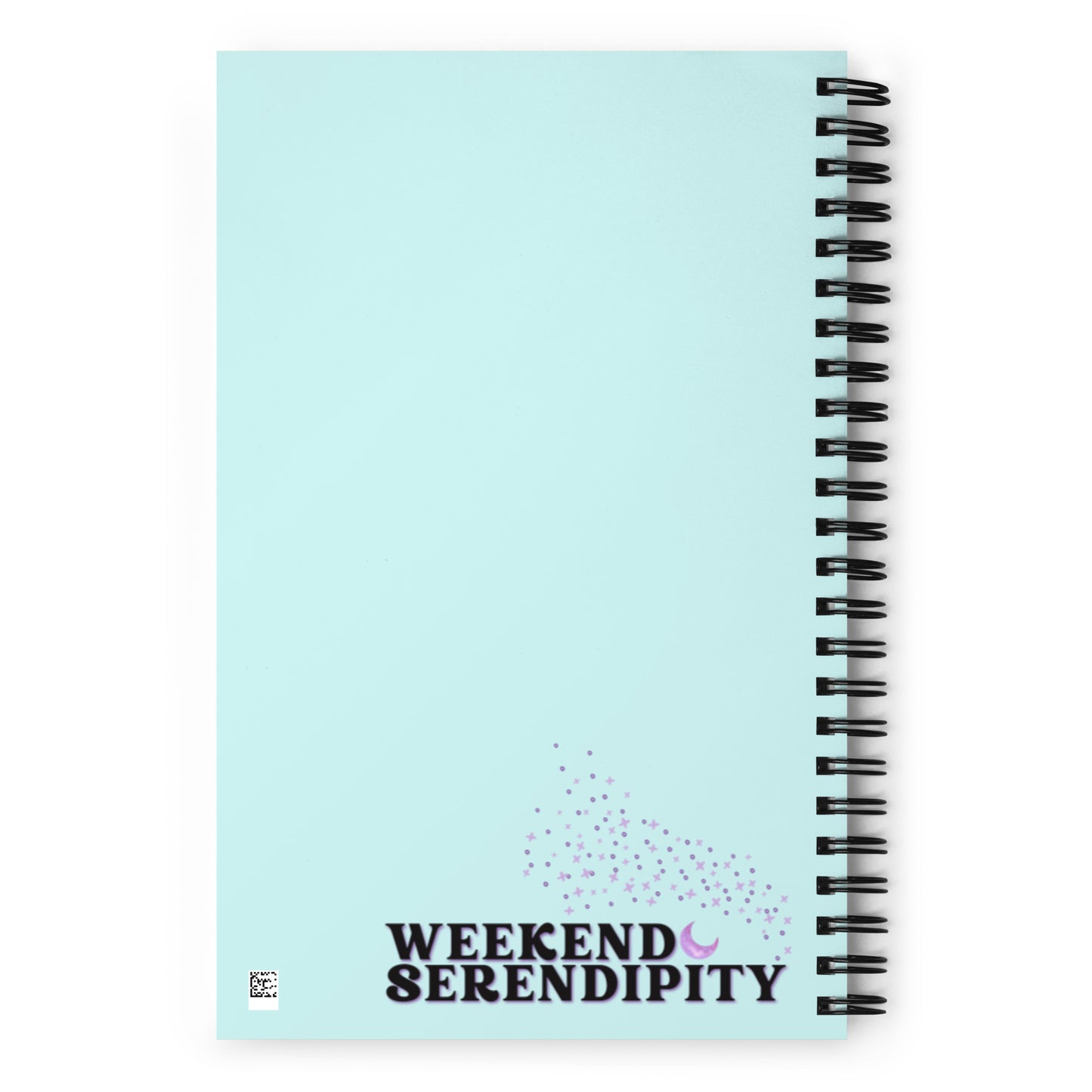 backside of a spiral bound notebook with the Weekend Serendipity logo